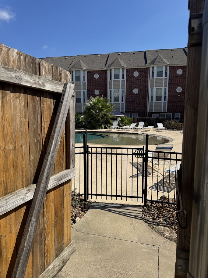 1198 Jones-Butler Road, Unit 1904 College Station, TX 77840 - Photo 16 of 17 Gate with a community pool
