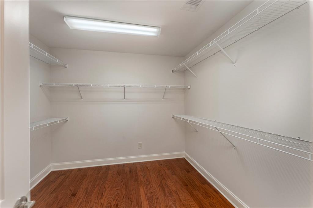 624 East Hampton Place Canton, GA 30115 - Photo 20 of 37 a view of a room with racks on the wall