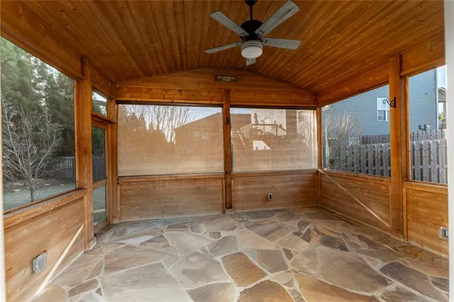 a view of a room with a large window