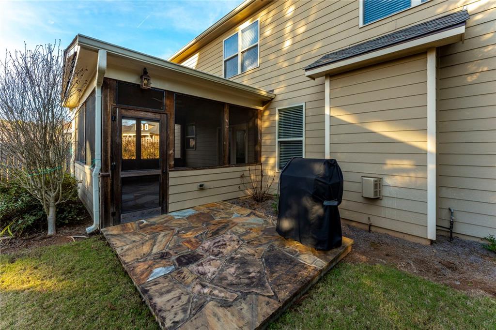 624 East Hampton Place Canton, GA 30115 - Photo 28 of 37 a view of a porch with a door