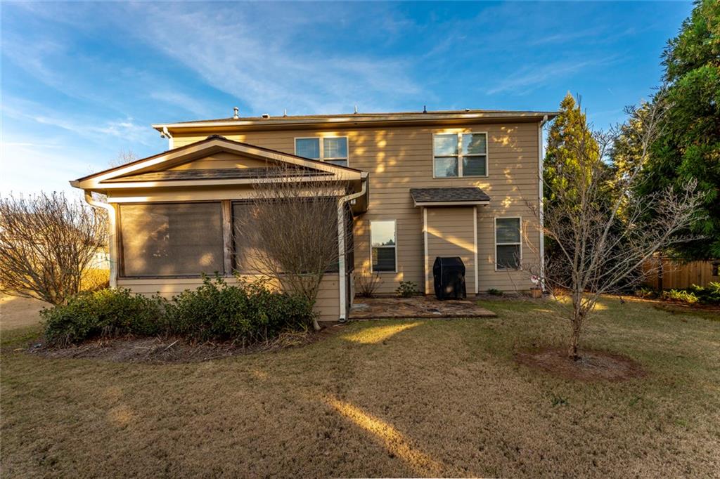 624 East Hampton Place Canton, GA 30115 - Photo 30 of 37 a front view of a house with garden