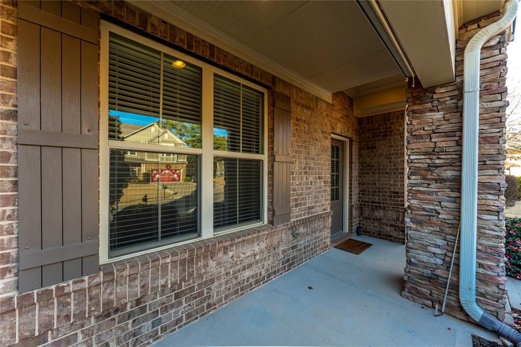 624 East Hampton Place Canton, GA 30115 - Photo 5 of 37 a view of house with wooden door