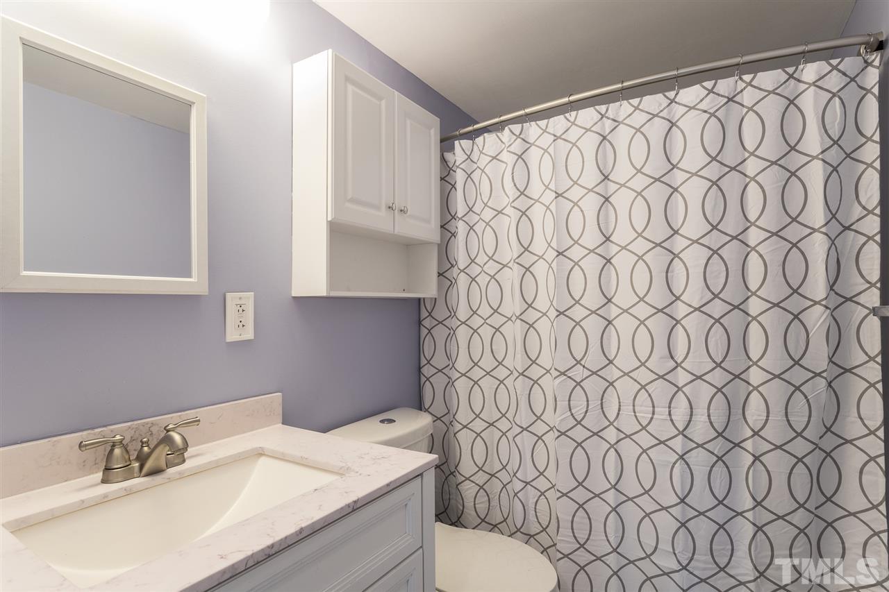 8005 Mourning Dove Road Raleigh, NC 27615 - Photo 11 of 22 Renovated bathroom