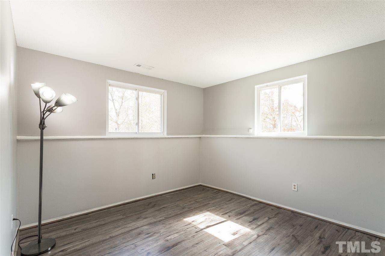 8005 Mourning Dove Road Raleigh, NC 27615 - Photo 15 of 22 Third bedroom with ample size, light, and privacy.