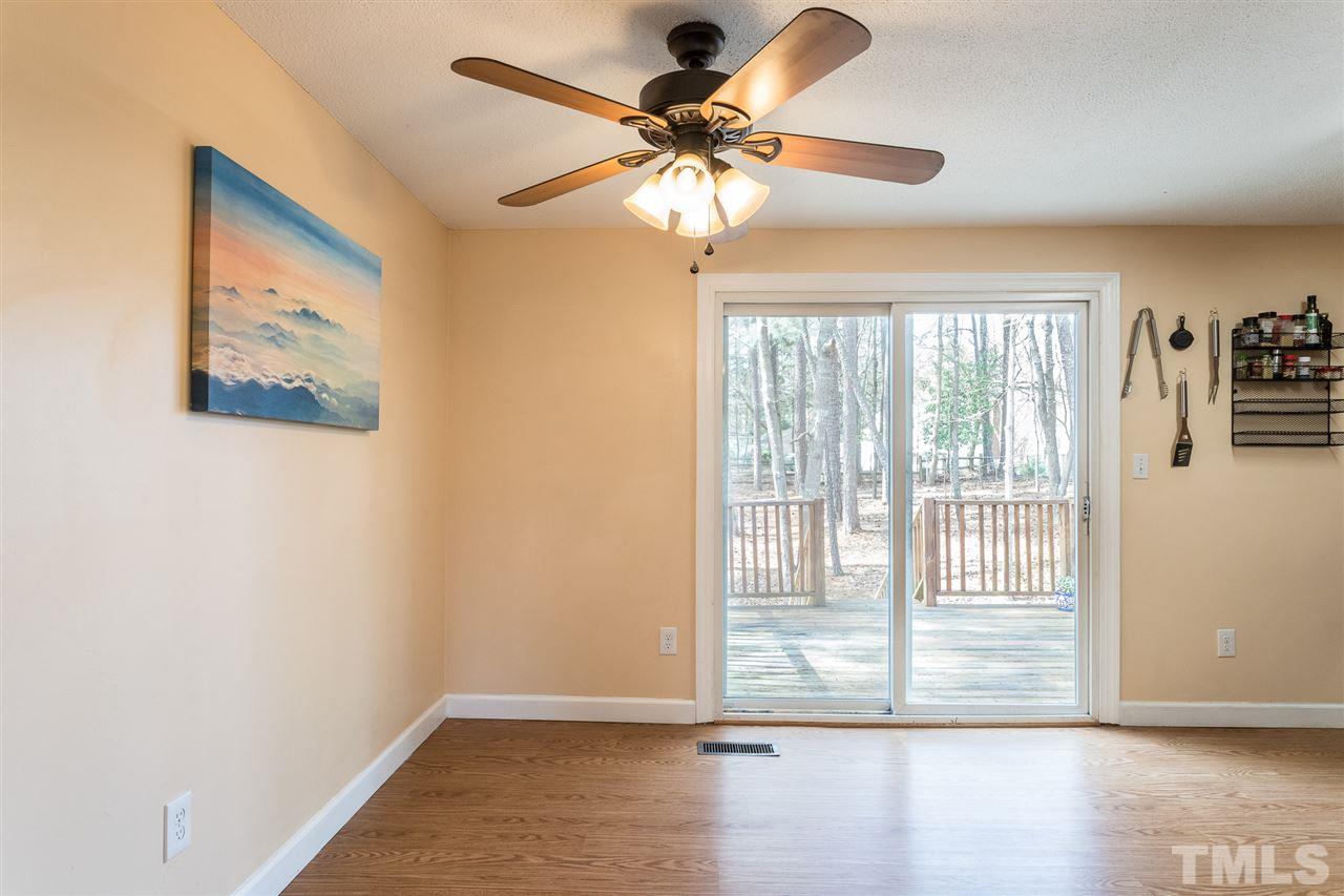 8005 Mourning Dove Road Raleigh, NC 27615 - Photo 5 of 22 When you're finished grilling on the back deck, step through the sliding glass door and right back into the fun. Or, leave the glass door open and experience the elusive blend of indoor/outdoor living!