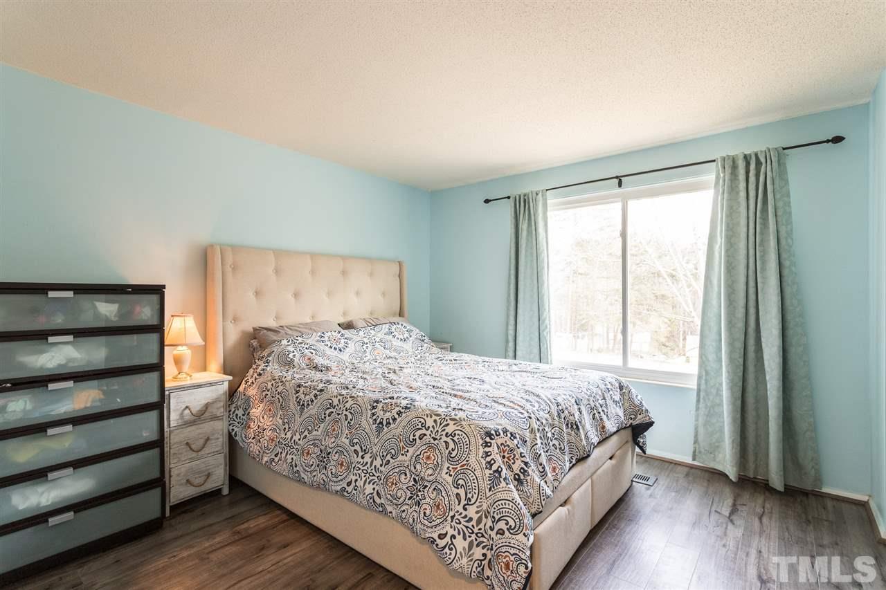8005 Mourning Dove Road Raleigh, NC 27615 - Photo 10 of 22 Spacious master bedroom with natural light.