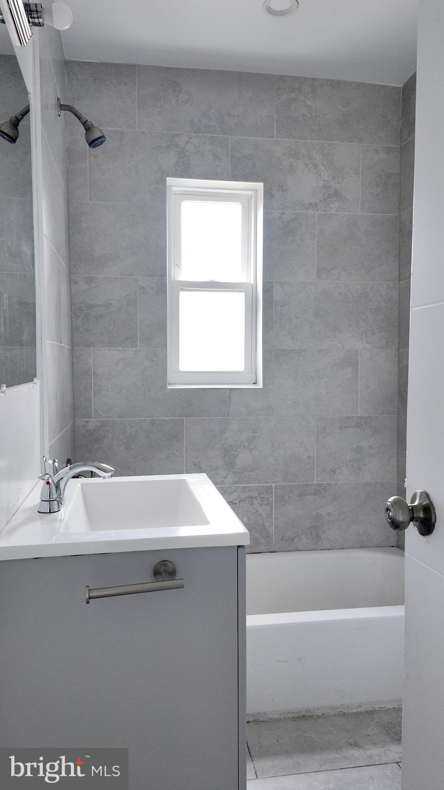 4306 Halley Terrace Southeast, Unit 2 Washington, DC 20032 - Photo 6 of 7 Bathroom