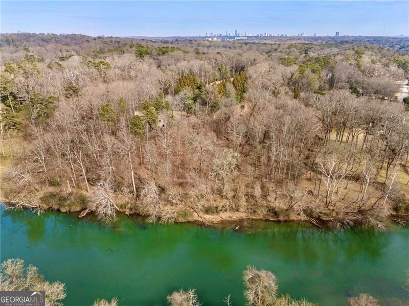 2100 West Wesley Road Northwest Atlanta, GA 30327 - Photo 27 of 42 a view of lake with green space