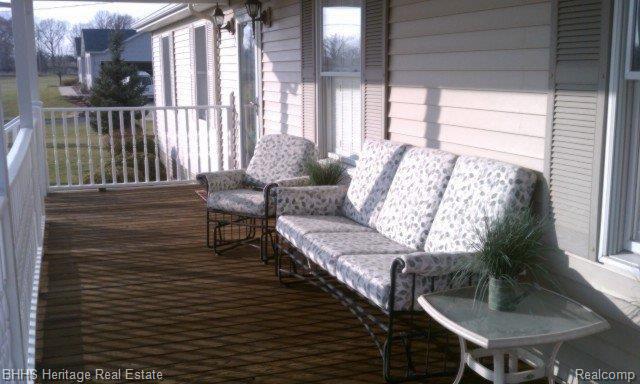 4455 Hibbard Road Corunna, MI 48817 - Photo 2 of 14 front proch