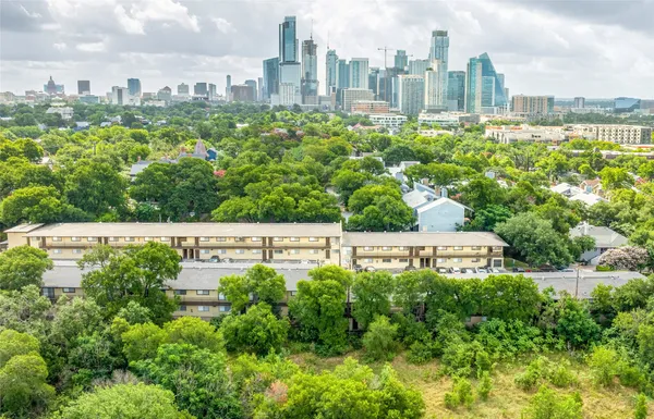 a view of a city with tall buildings