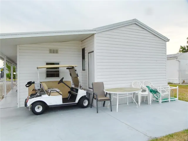 a view of a car garage with car parked