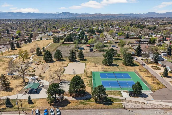 an aerial view of residential houses with outdoor space