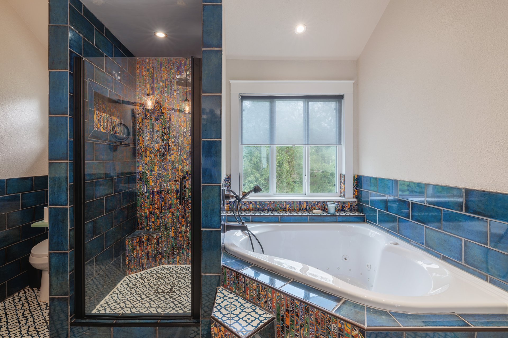 7000 Bending Oak Road Austin, TX 78749 - Photo 22 of 39 a bathroom with a bathtub and a shower