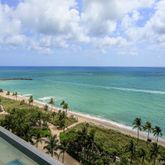 a view of a lake with a yard