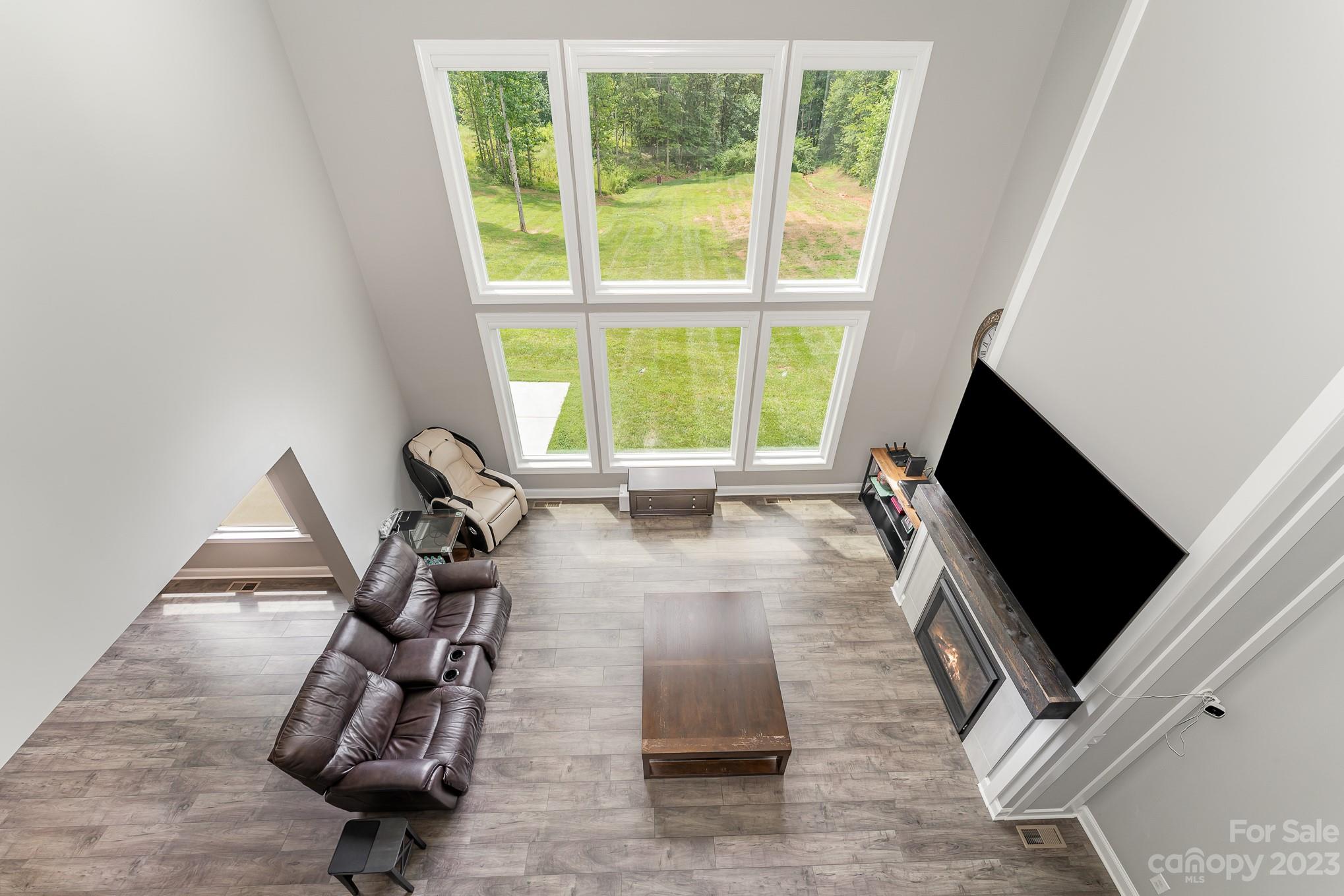 556 Sain Road Mocksville, NC 27028 - Photo 18 of 48 a living room with furniture and a flat screen tv