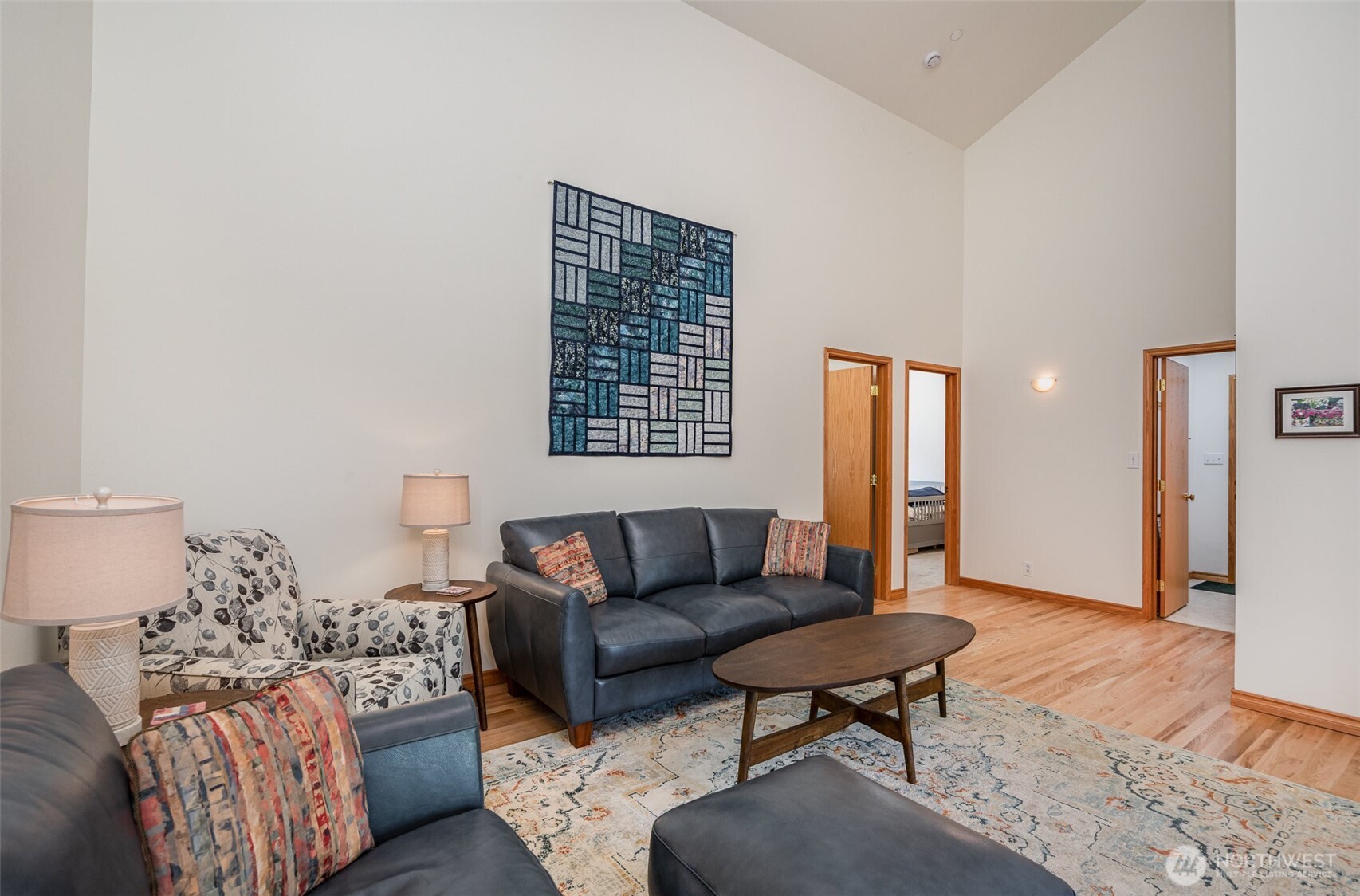 19716 Southeast 220th Street Renton, WA 98058 - Photo 12 of 36 a living room with furniture and a rug