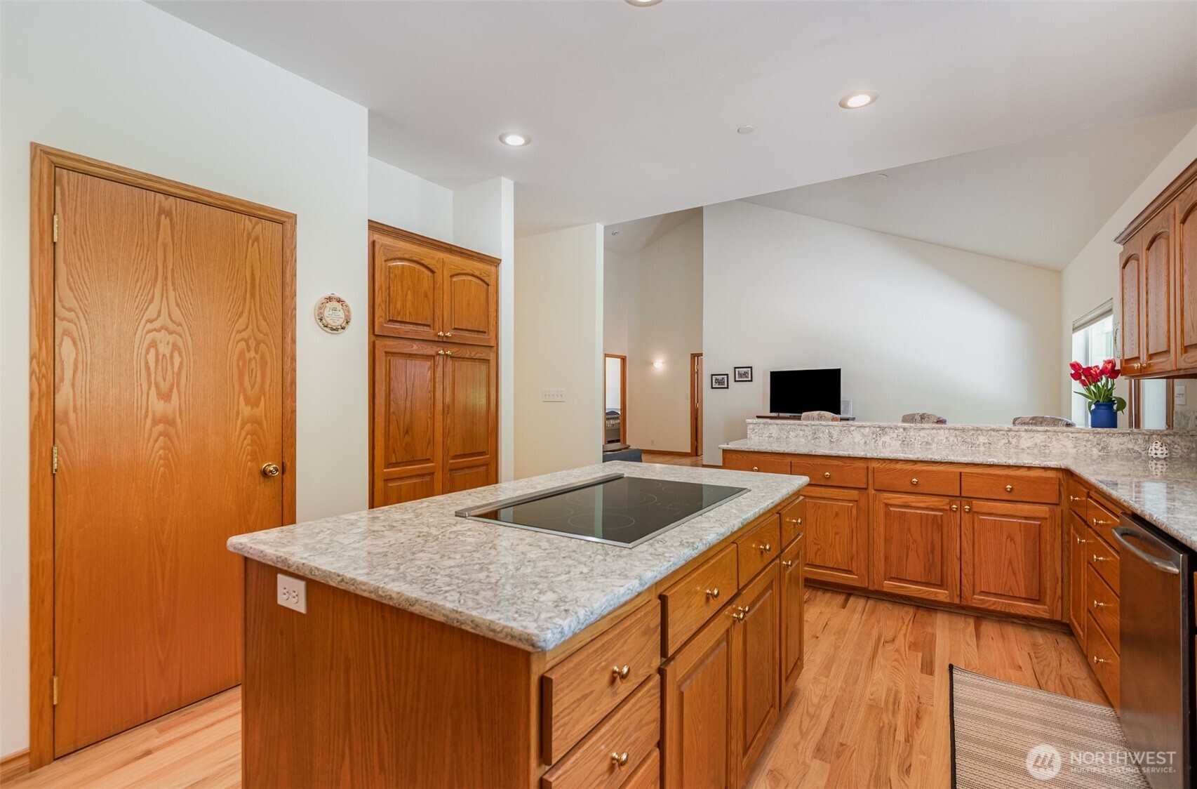 19716 Southeast 220th Street Renton, WA 98058 - Photo 18 of 36 a kitchen with stainless steel appliances granite countertop a sink and dishwasher refrigerator stove