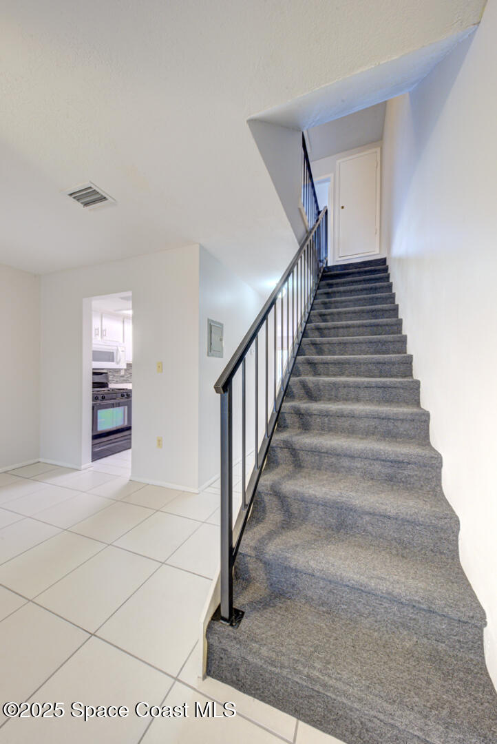4749 Sisson Road Titusville, FL 32780 - Photo 17 of 30 staircase
