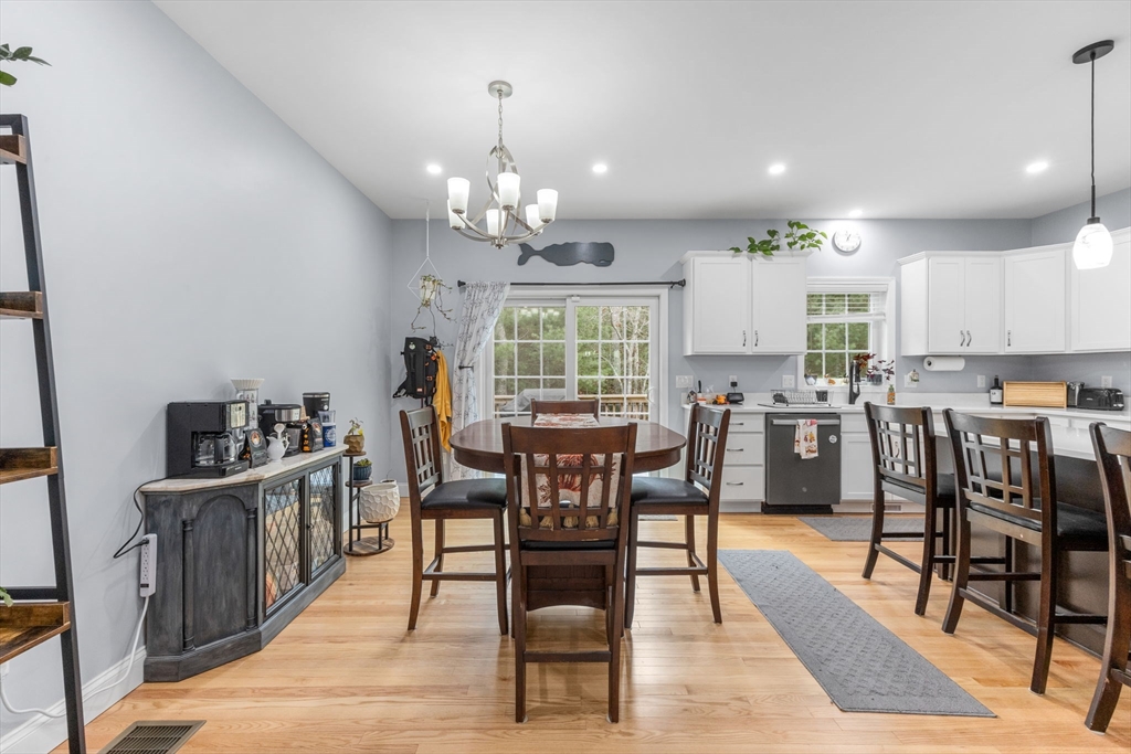 85 Waterhouse Road Bourne, MA 02532 - Photo 6 of 28 a view of a dining room with furniture window and wooden floor