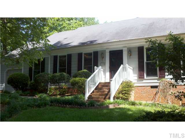 4613 Old Village Road Raleigh, NC 27612 - Photo 1 of 6 a view of a house with backyard porch and sitting area