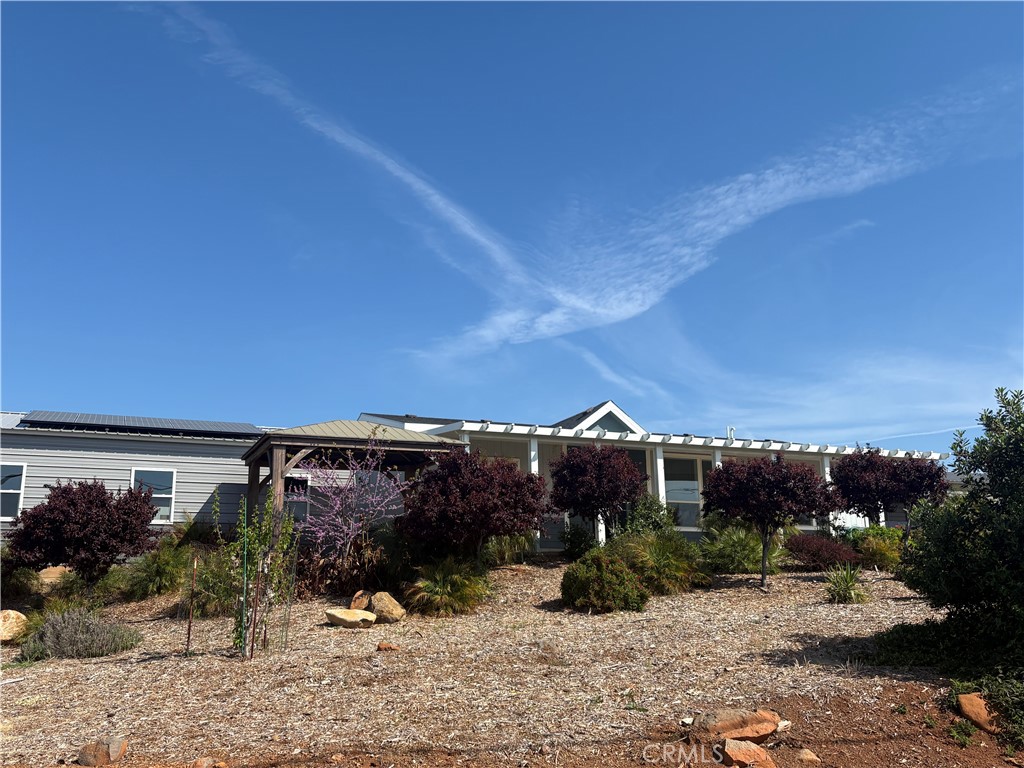 5548 Newland Road Paradise, CA 95969 - Photo 18 of 23 a view of a street with a building in the background