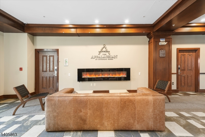 200 Highway 94, Unit 249 Vernon, NJ 07462 - Photo 4 of 28 a bed sitting in a bedroom next to a window