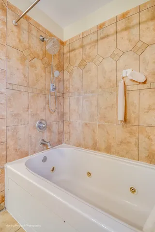 a bathroom with a bathtub
