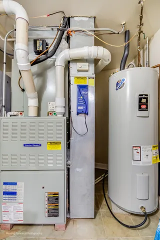 a view of storage and utility room with washer and dryer