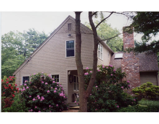 91 Allen's Point Road Marion, MA 02738 - Photo 1 of 6 a view of a house with a backyard