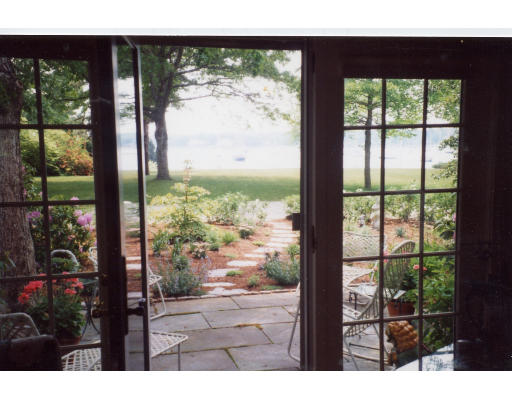 91 Allen's Point Road Marion, MA 02738 - Photo 4 of 6 a view of a yard from a balcony