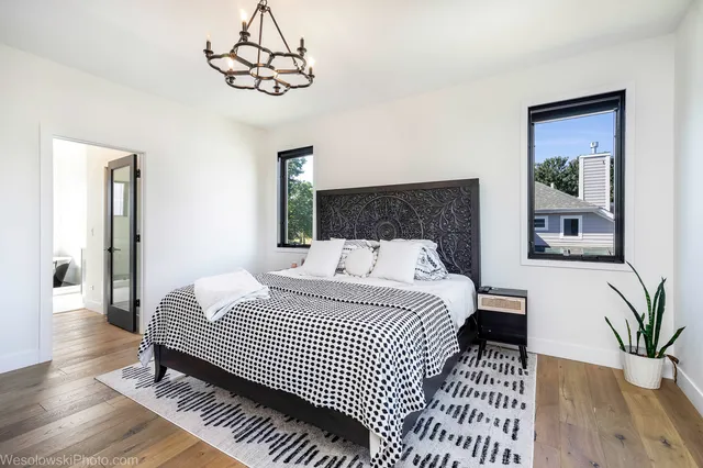 a bathroom with a sink a mirror and a bathtub