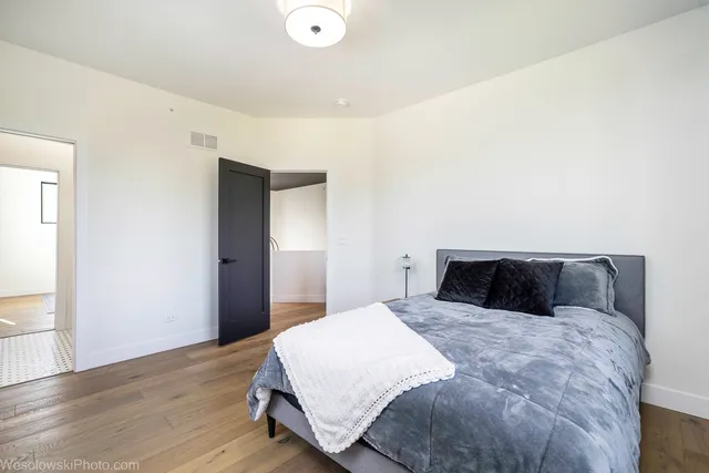 a bathroom with a bathtub a toilet and a shower