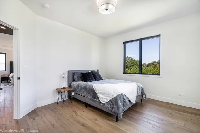 a view of empty room with wooden ceiling