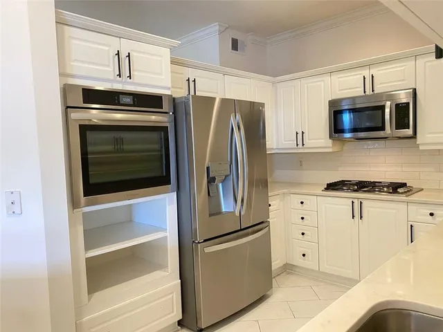 a view of a chandelier in a room