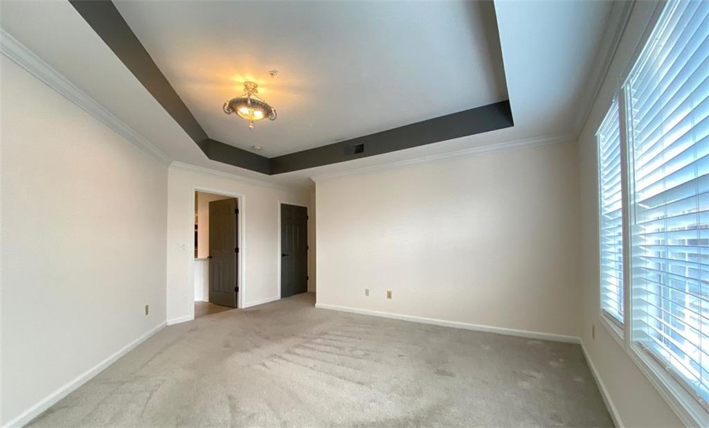 3047 Lenox Road Northeast, Unit 1202 Atlanta, GA 30324 - Photo 30 of 69 a view of an empty room and a window