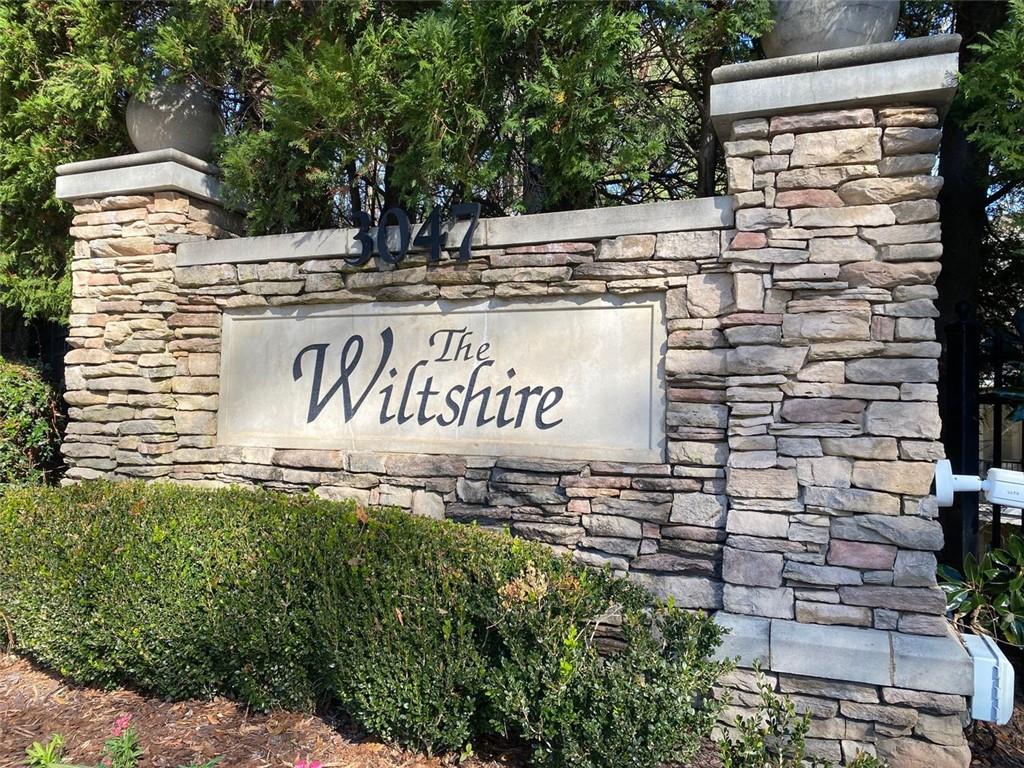 3047 Lenox Road Northeast, Unit 1202 Atlanta, GA 30324 - Photo 3 of 69 a view of outdoor space with garden and trees