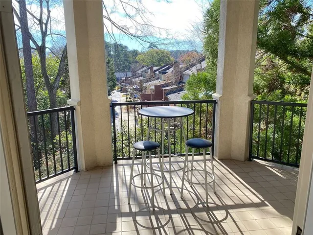 an aerial view of a house with balcony