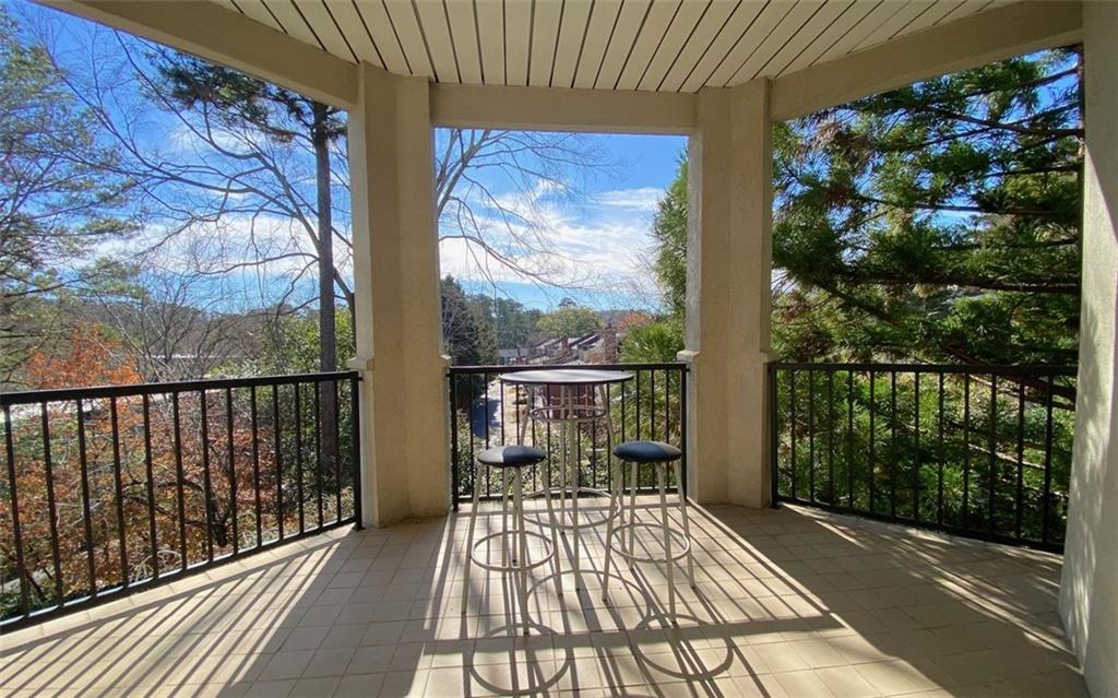 3047 Lenox Road Northeast, Unit 1202 Atlanta, GA 30324 - Photo 46 of 69 a view of balcony with wooden floor