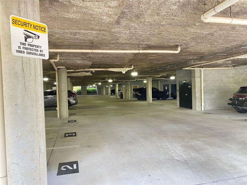 3047 Lenox Road Northeast, Unit 1202 Atlanta, GA 30324 - Photo 55 of 69 a view of a building with parking