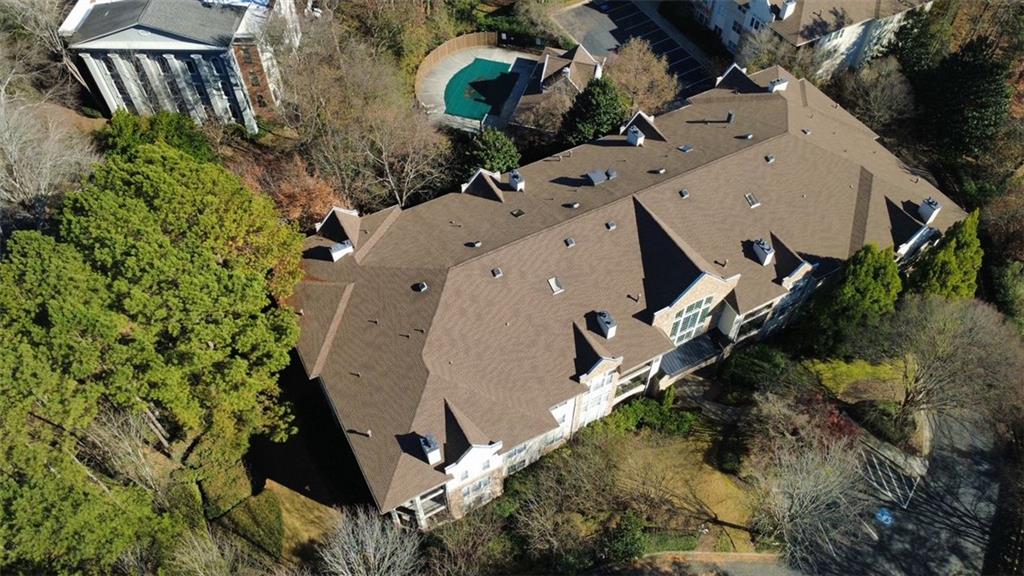 3047 Lenox Road Northeast, Unit 1202 Atlanta, GA 30324 - Photo 57 of 69 an aerial view of a house with a yard