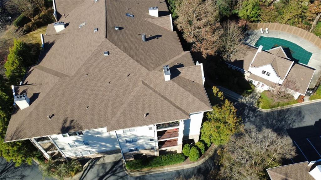 3047 Lenox Road Northeast, Unit 1202 Atlanta, GA 30324 - Photo 62 of 69 an aerial view of a house with a yard