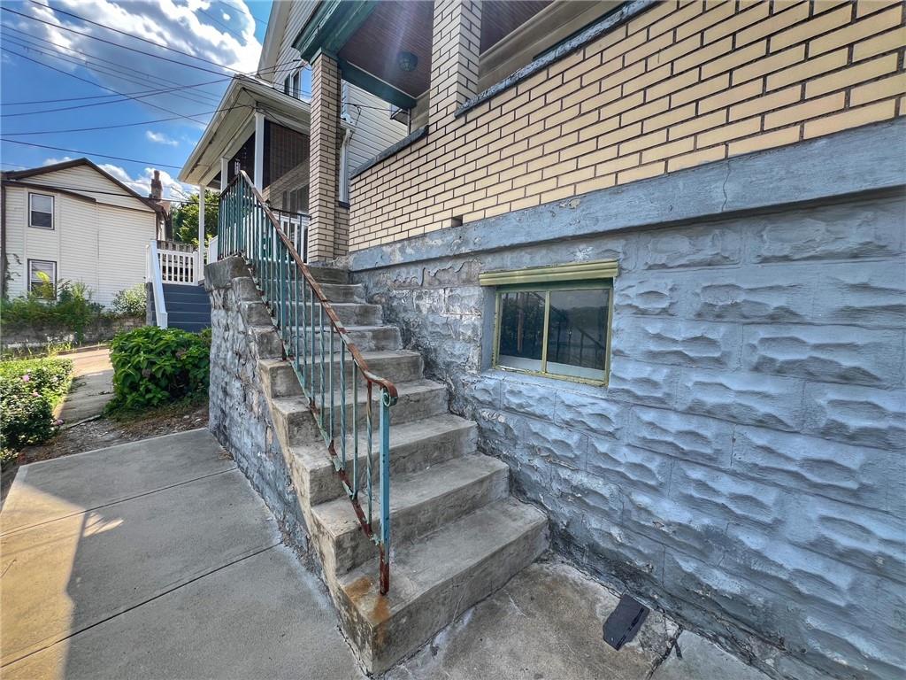 503 Vulcan Street McKees Rocks, PA 15136 - Photo 5 of 19 Stairs from street taking you to the main entry