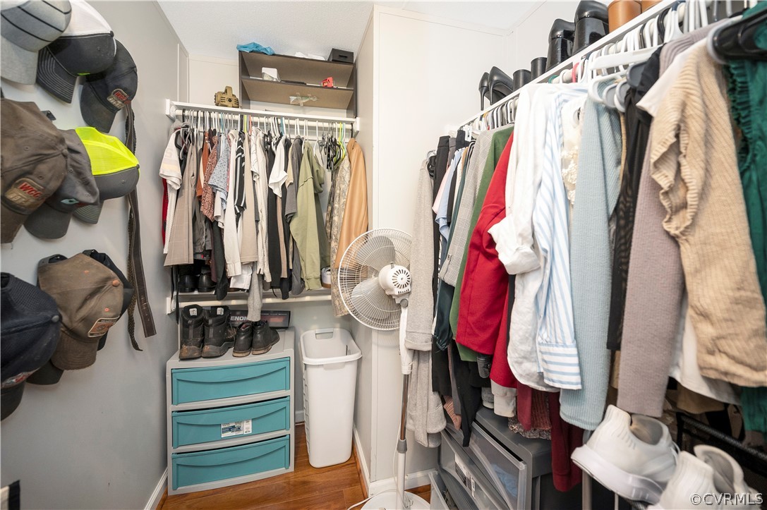 3634 Shirleys Hill Road Partlow, VA 22534 - Photo 13 of 22 a view of walk in closet with clothes and shoes