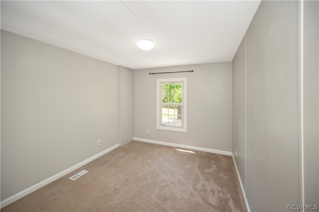 3634 Shirleys Hill Road Partlow, VA 22534 - Photo 19 of 22 an empty room with windows