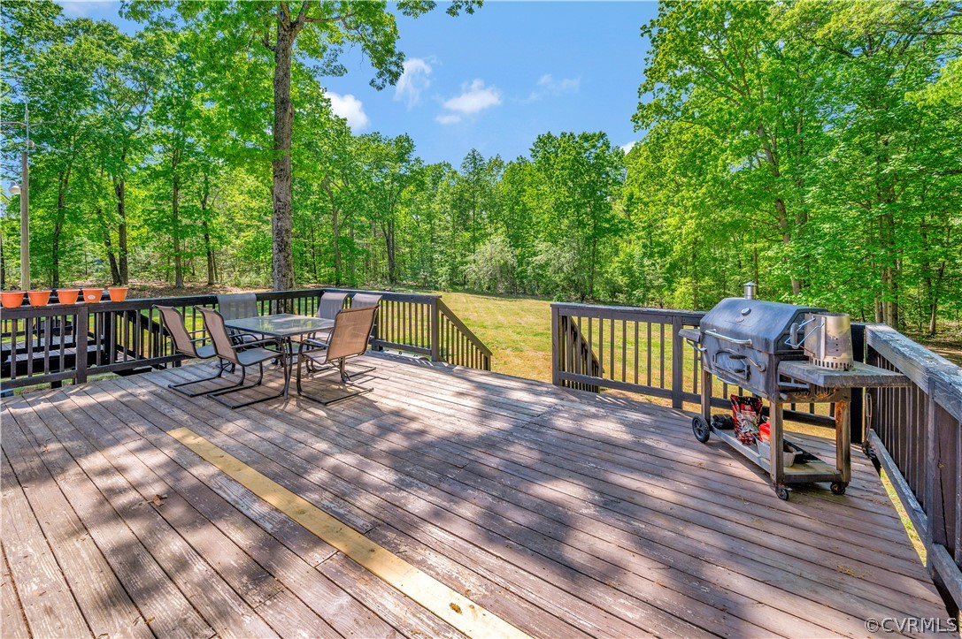 3634 Shirleys Hill Road Partlow, VA 22534 - Photo 21 of 22 a view of a chairs and table on the wooden floor