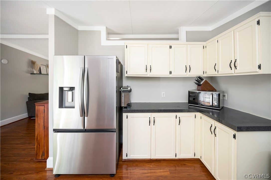 3634 Shirleys Hill Road Partlow, VA 22534 - Photo 8 of 22 a kitchen with stainless steel appliances a refrigerator and white cabinets