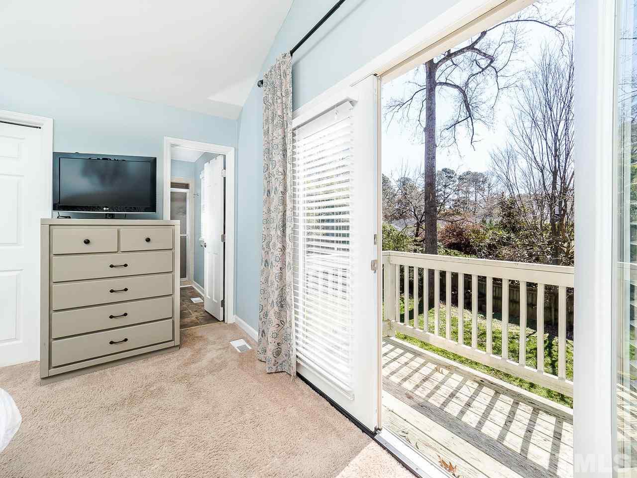 2002 Port Royal Road Raleigh, NC 27609 - Photo 11 of 23 a view of bedroom with furniture and flat screen tv