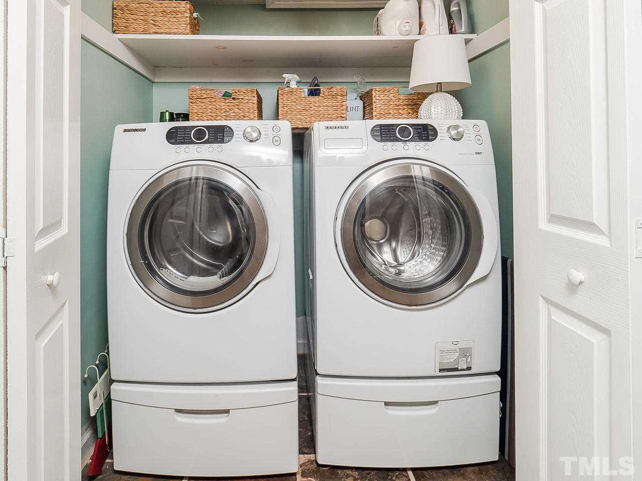 2002 Port Royal Road Raleigh, NC 27609 - Photo 15 of 23 a utility room with dryer and washer