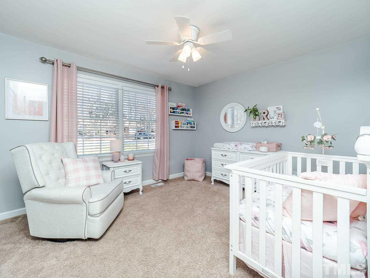2002 Port Royal Road Raleigh, NC 27609 - Photo 16 of 23 a living room with furniture and a large window