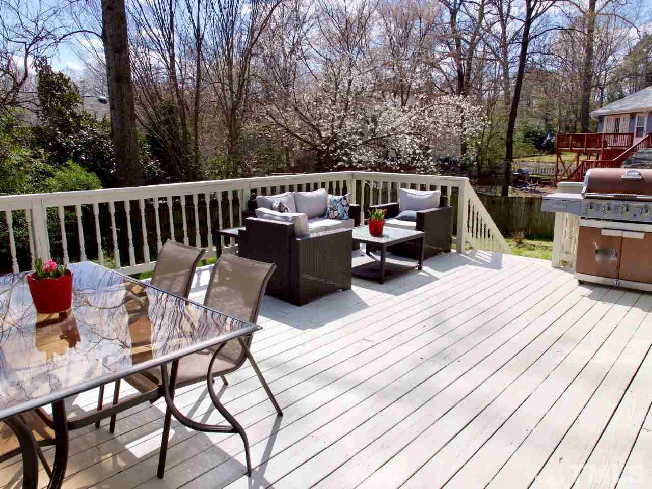 2002 Port Royal Road Raleigh, NC 27609 - Photo 21 of 23 a view of roof deck with furniture and trees